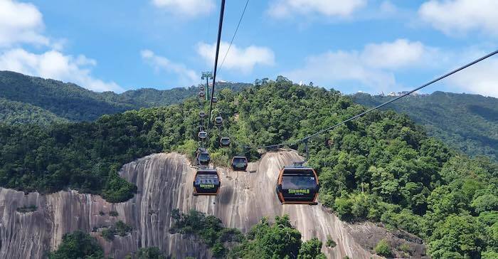 Two wires of cable cars climbing a hill