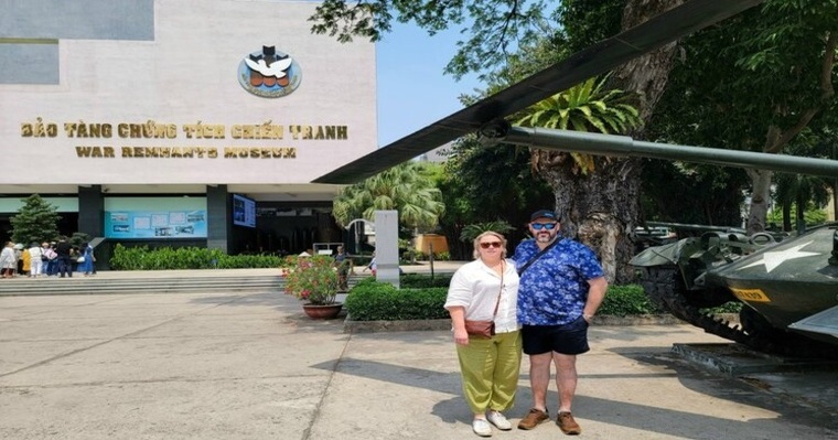 two people standing in front of a museum 