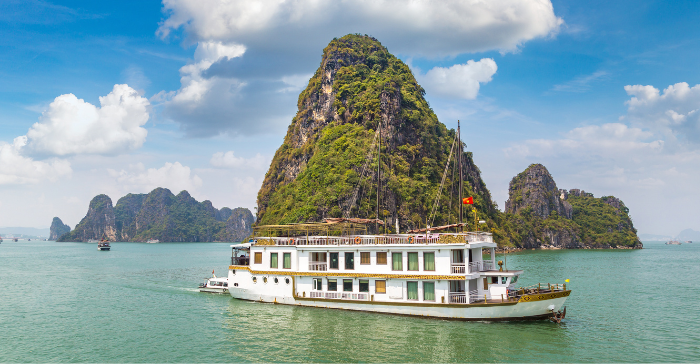 a cruise ship in a scenic bay