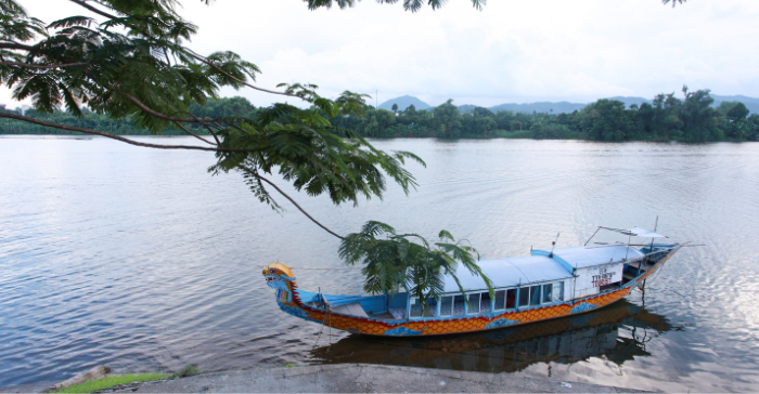 a dragon boat on the river 