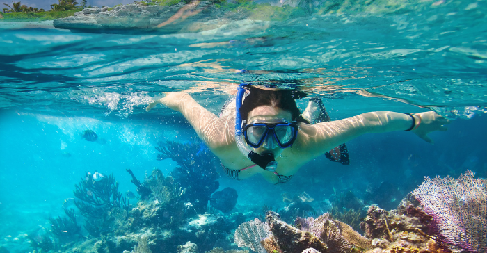 a woman snorkelling