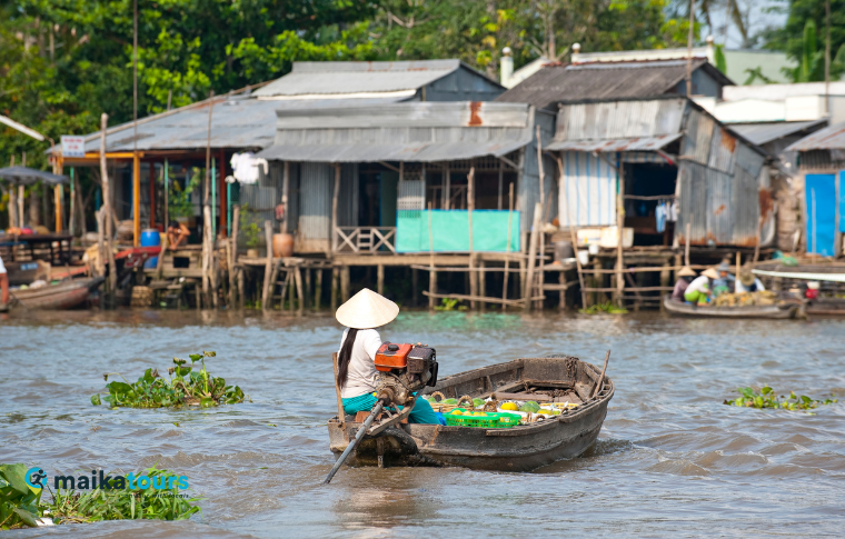 a woman on a motorised boat