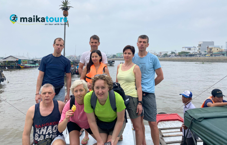 a group of tourists on a boat