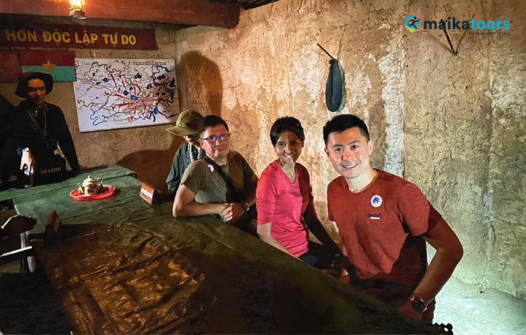 tourists in an underground chamber 